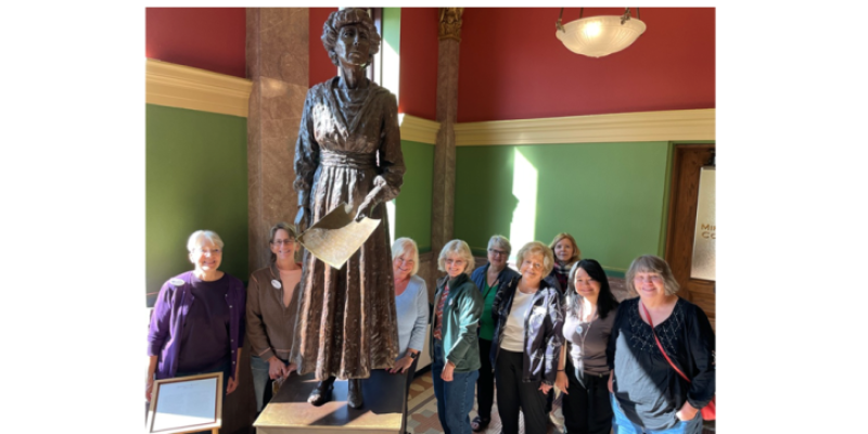 League members at the Jeannette Rankin statue in the Montana State Capitol
